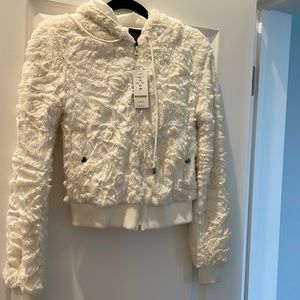 Furry hooded white jacket